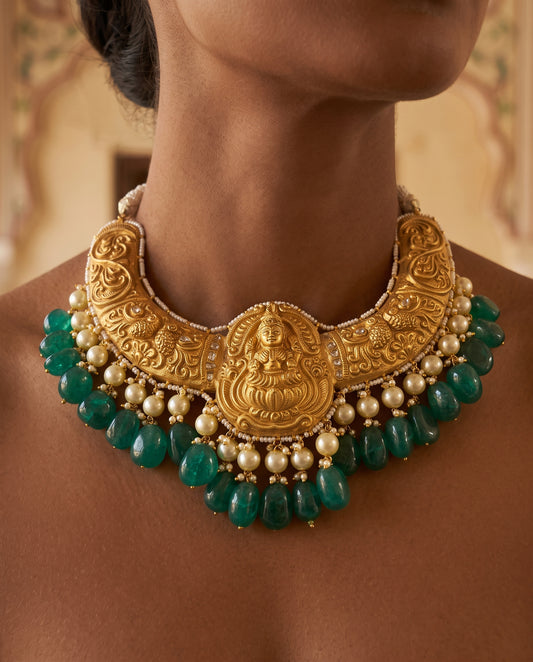 Handcrafted 22kt Gold Lakshmi Hasli Rigid Collar Necklace with Goddess Lakshmi Motif and 3 Carat Certified Syndicate Polki in Thapa Work