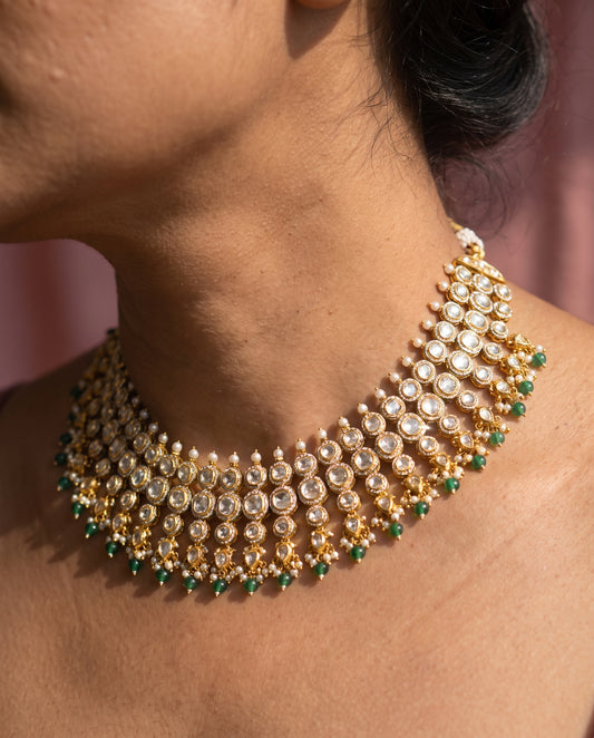 Handcrafted 22kt Gold Three Layer Set with 40 Carat Certified Syndicate Polki Across Three Strands in Thapa Work