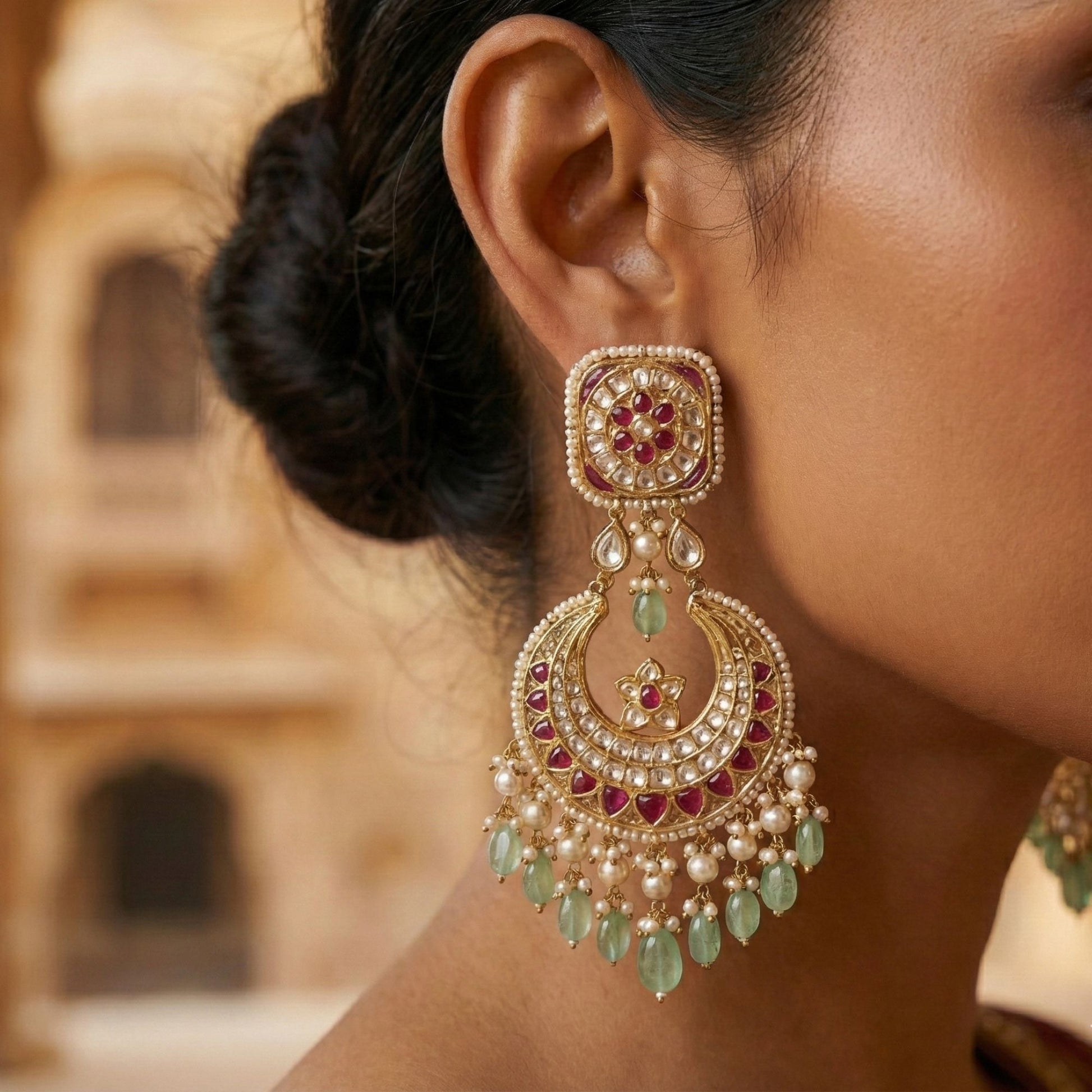 Bridal chaandbaali earrings in 22KT gold with natural Polki and green stones — handcrafted Rajasthani statement earrings for weddings and festive wear
