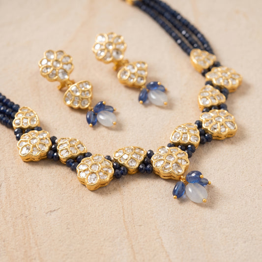 Handcrafted 22kt Gold Jakarti Set with 7 Carat Certified Syndicate Polki and Blue Bead Drops in Thapa Work