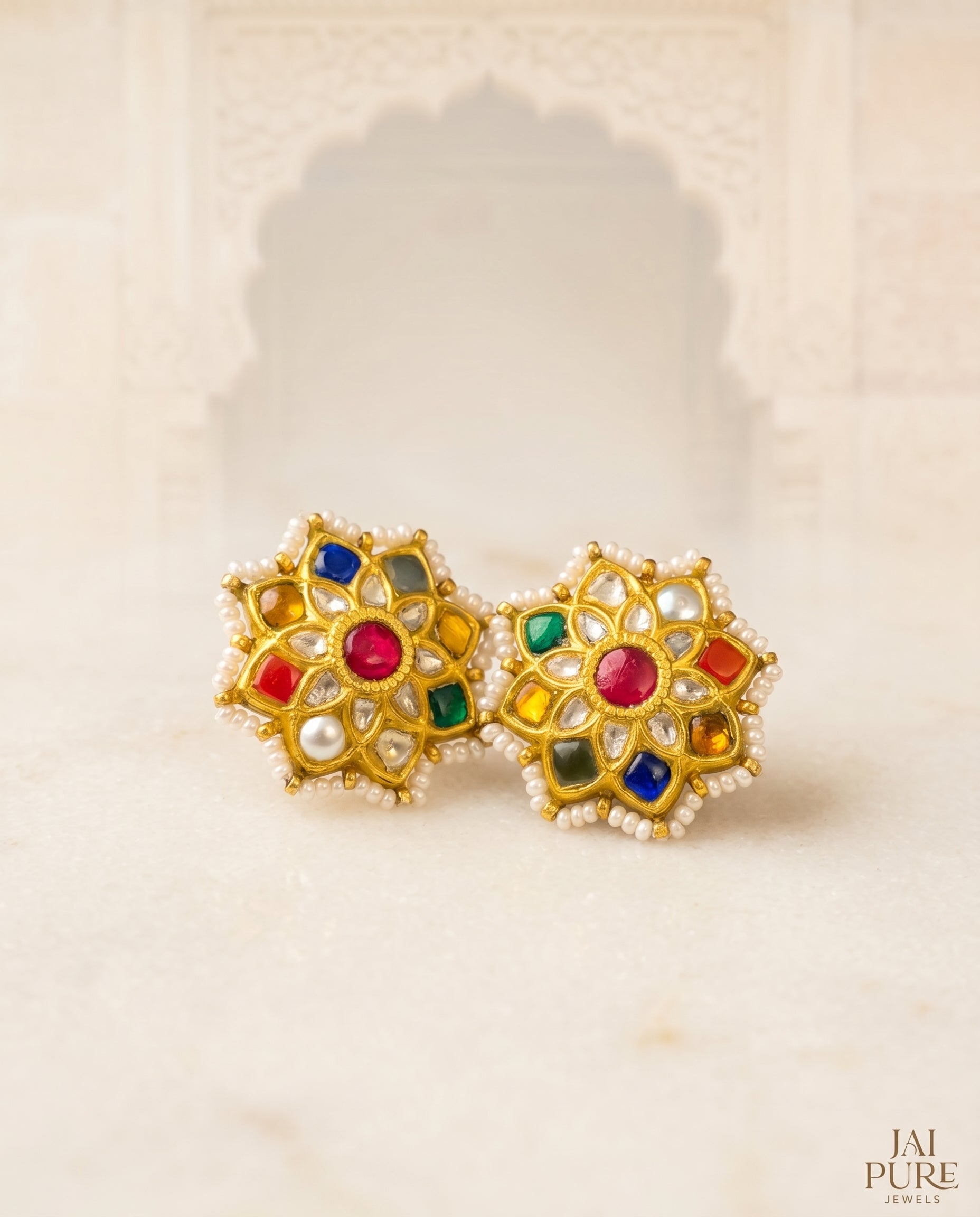 Handcrafted 22kt Gold Navratan Star Studs with 2 Carat Certified Syndicate Polki and Multi-Colour Semi Precious Stones in Thapa Work