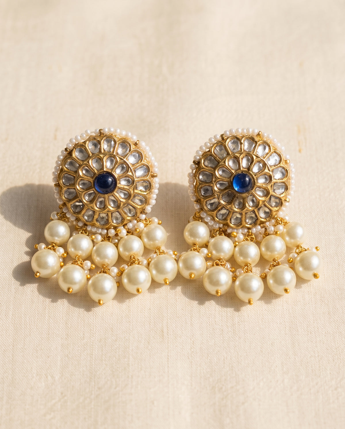Handcrafted 22kt Gold Blue Studs with 2 Carat Certified Syndicate Polki and Blue Semi Precious Stones in Thapa Work