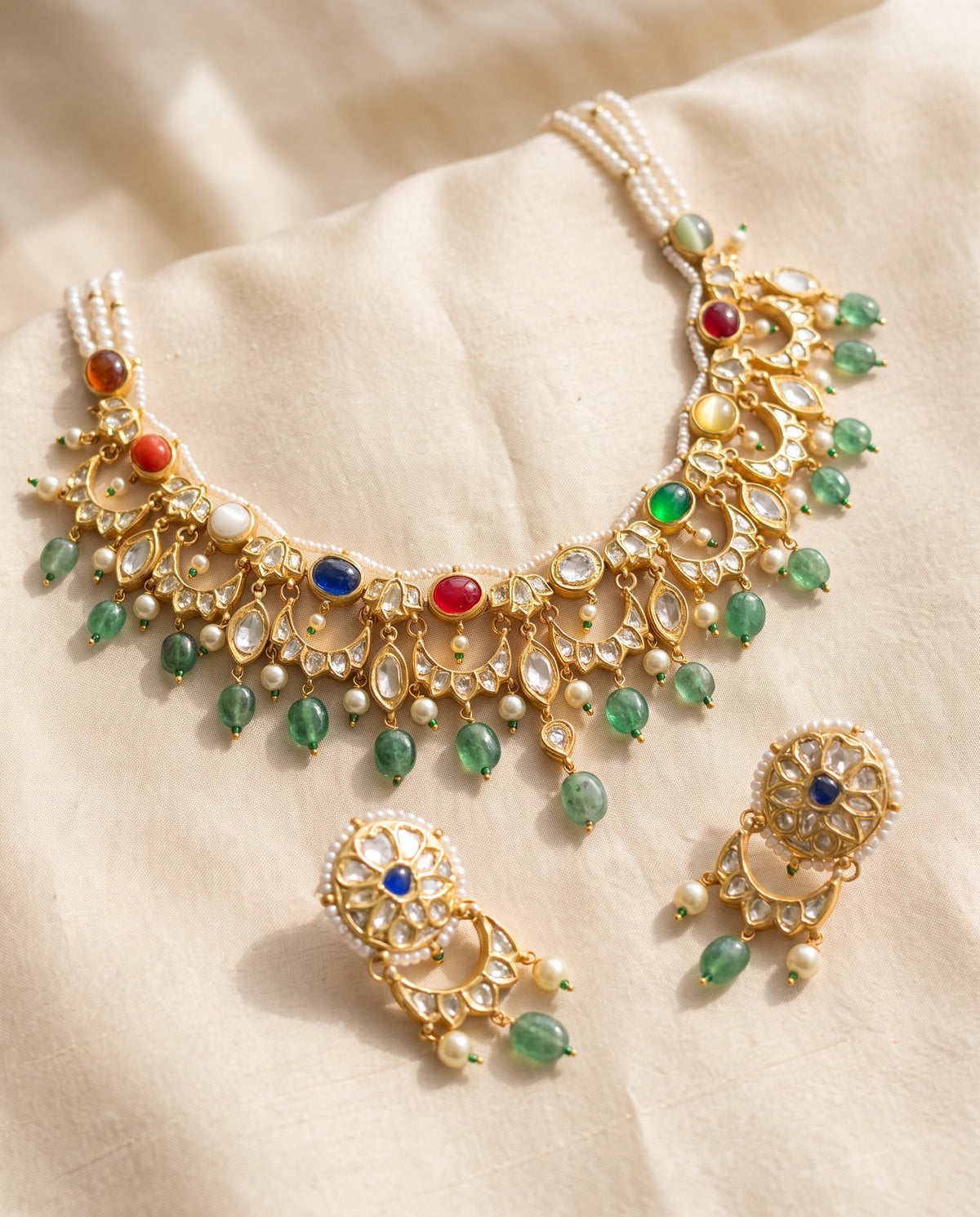 Handcrafted 22kt Gold Navratan Moon Reversible Set with 5 Carat Certified Syndicate Polki and Multi-Colour Semi Precious Stones in Thapa Work