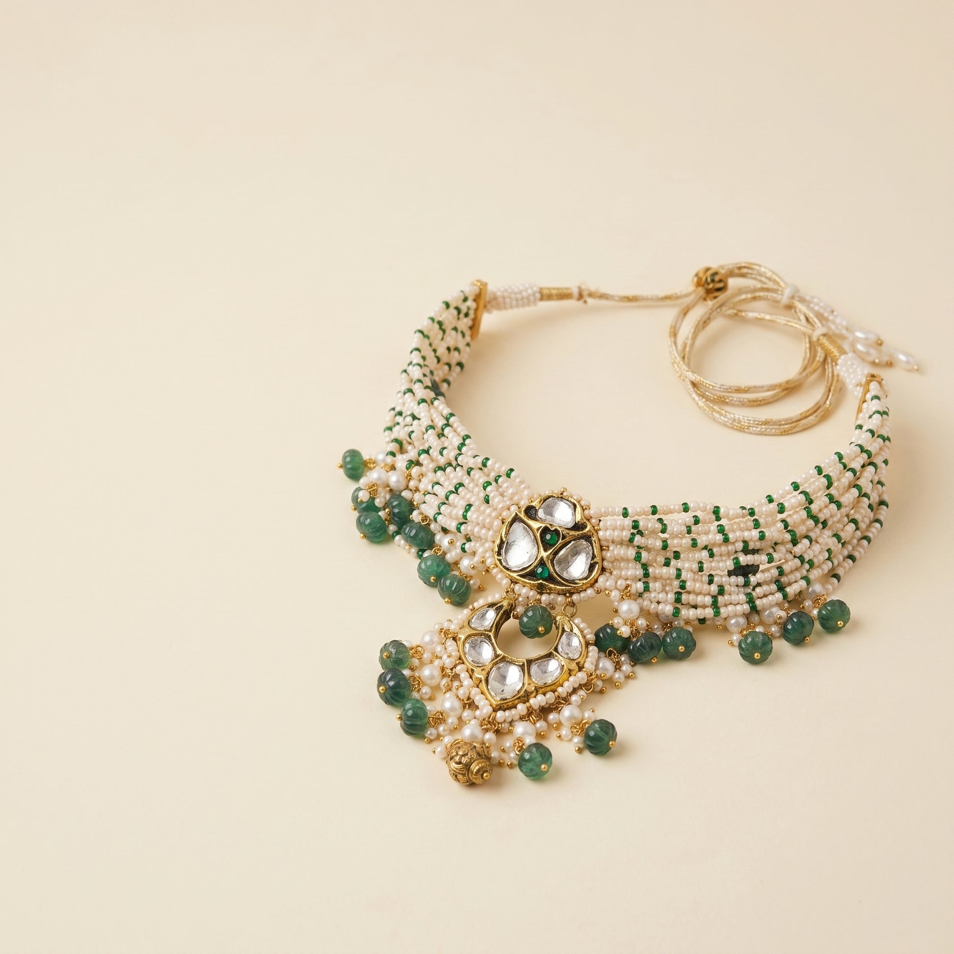 Handcrafted 22kt Gold Green Triangle Choker with Certified Syndicate Polki and Green Semi Precious Stones in Thapa Work
