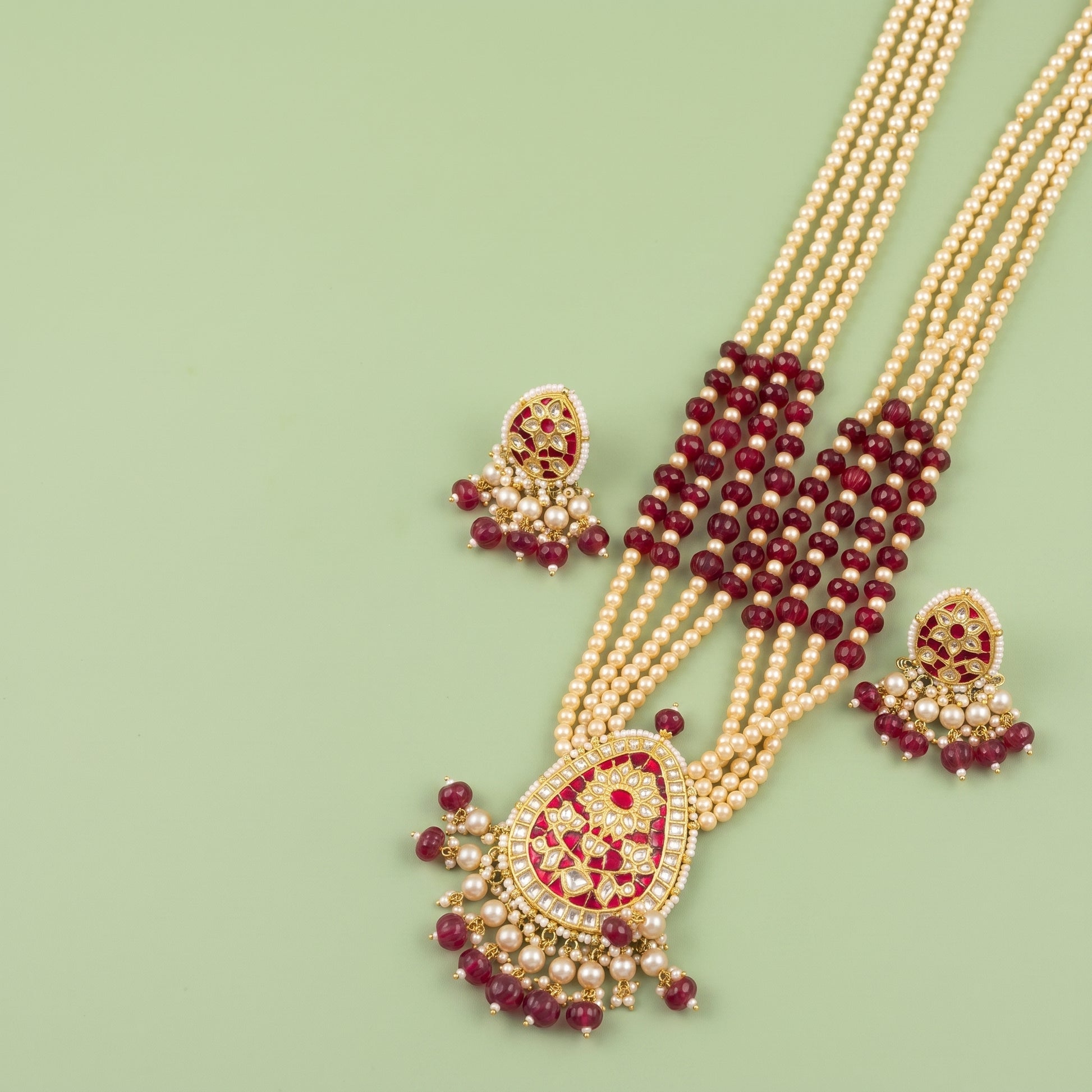 Handcrafted 22kt Gold Red Flower Pendant Set with 2 Carat Certified Syndicate Polki and Red Semi Precious Stones in Floral Thapa Work
