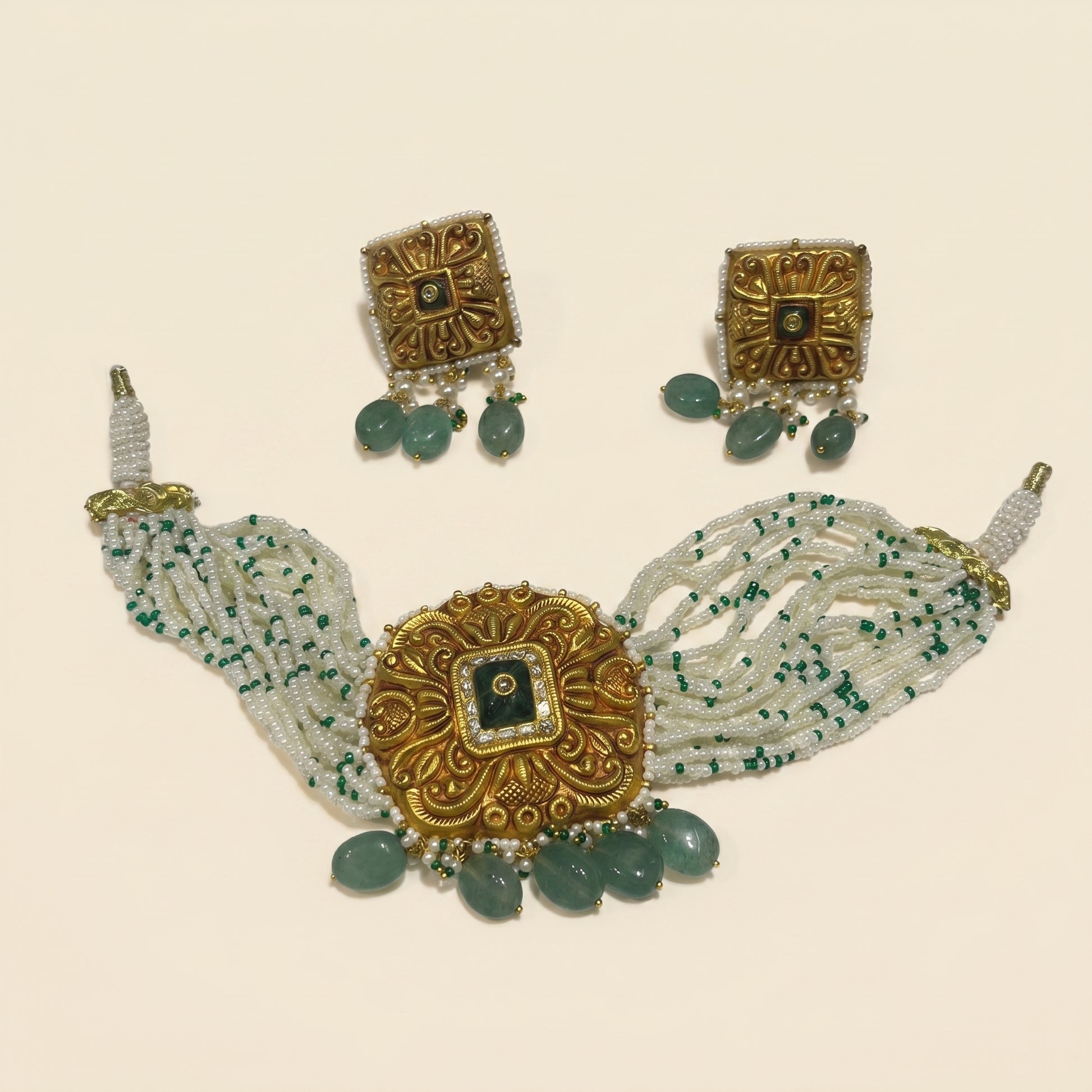 Handcrafted 22kt Gold Square Temple Green Set with 2 Carat Certified Syndicate Polki and Green Semi Precious Stones in Temple Motif Thapa Work