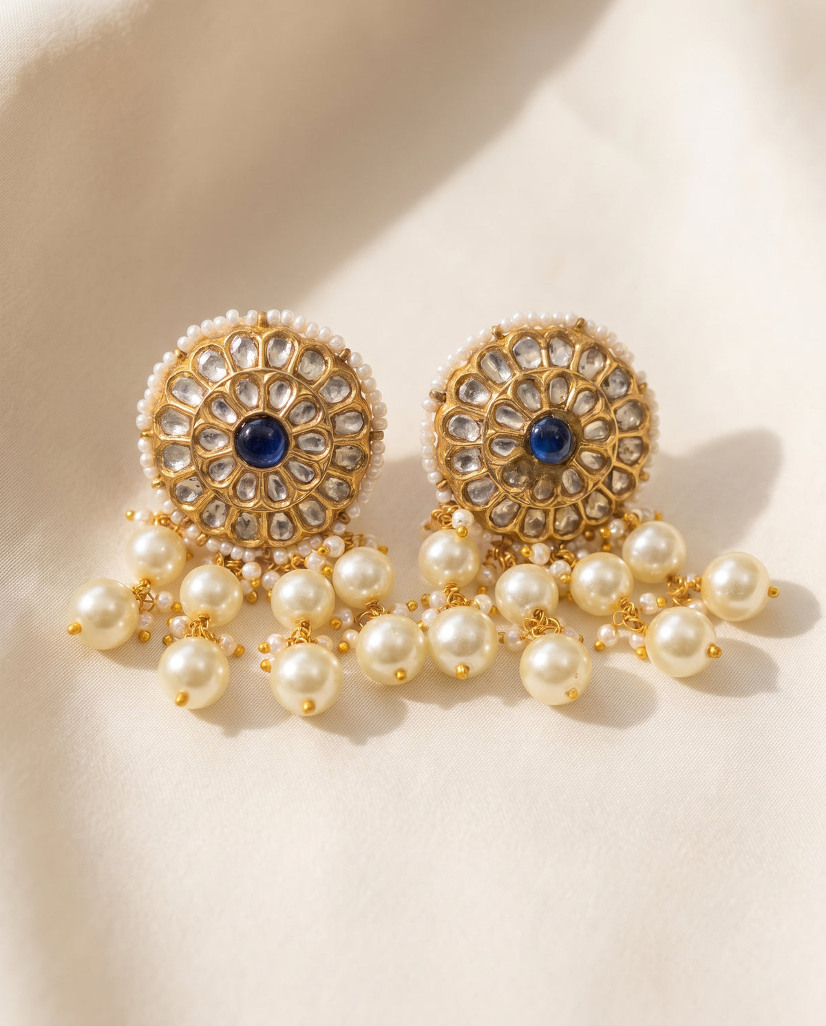 Handcrafted 22kt Gold Blue Studs with 2 Carat Certified Syndicate Polki and Blue Semi Precious Stones in Thapa Work