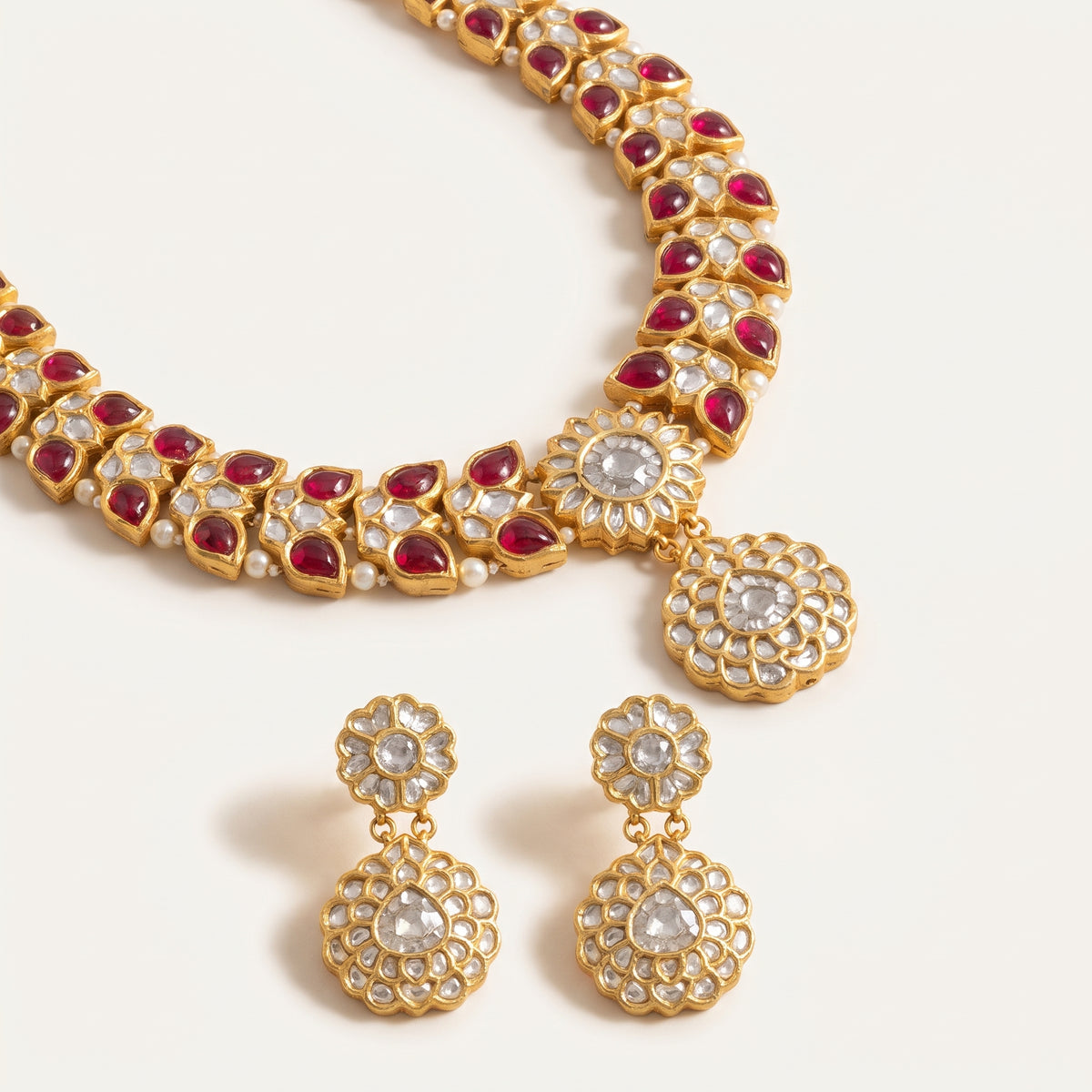 Handcrafted 22kt Gold Ruby Red Butterfly Necklace Set with 16 Carat Certified Syndicate Polki and Ruby Red Semi Precious Stones in Butterfly Motif Thapa Work