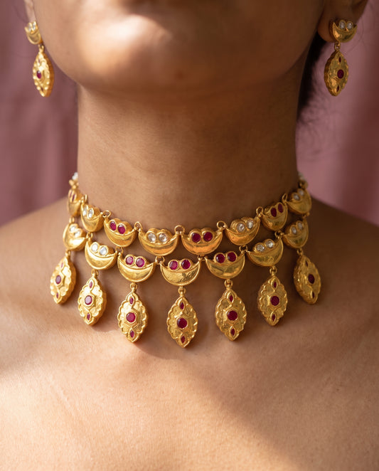 Handcrafted 22kt Gold Red Half Moon Set with 5 Carat Certified Syndicate Polki and Red Semi Precious Stones in Crescent Thapa Work