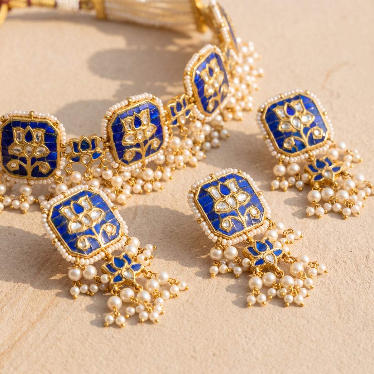 Handcrafted 22kt Gold Blue Lotus Set with 5 Carat Certified Syndicate Polki and Blue Semi Precious Stones in Lotus Motif Thapa Work