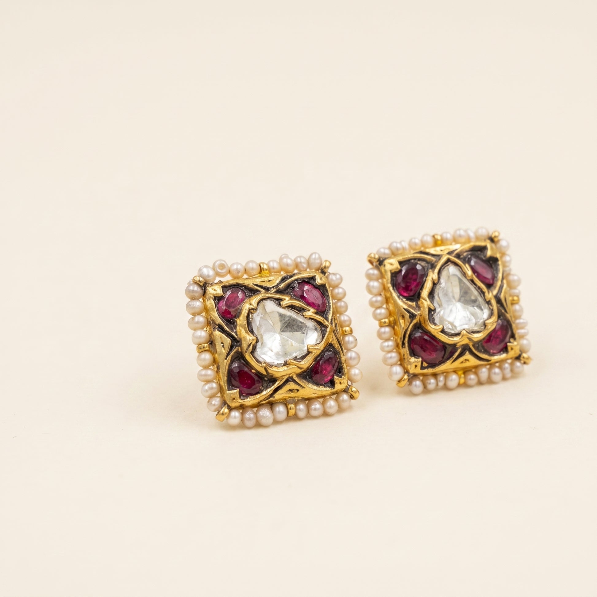 Handcrafted 22kt Gold Red Uncut Polki Studs with Certified Syndicate Polki and Red Semi Precious Stones in Thapa Work