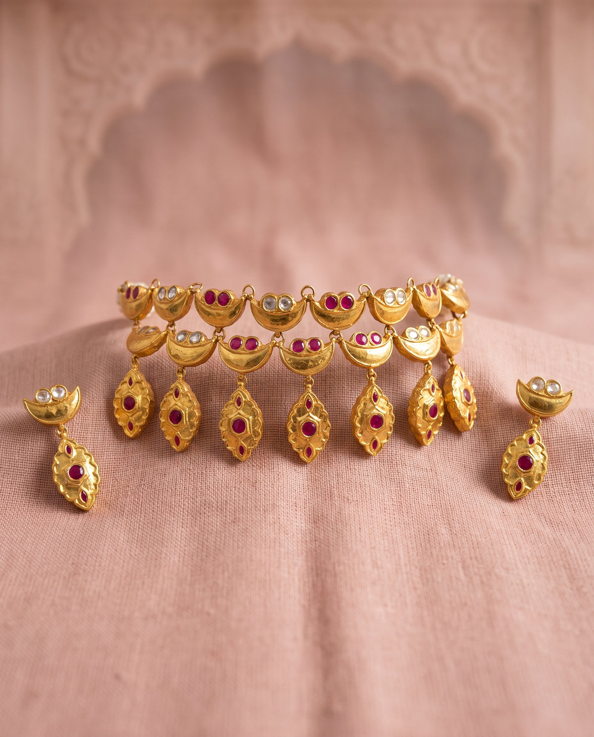 Handcrafted 22kt Gold Red Half Moon Set with 5 Carat Certified Syndicate Polki and Red Semi Precious Stones in Crescent Thapa Work
